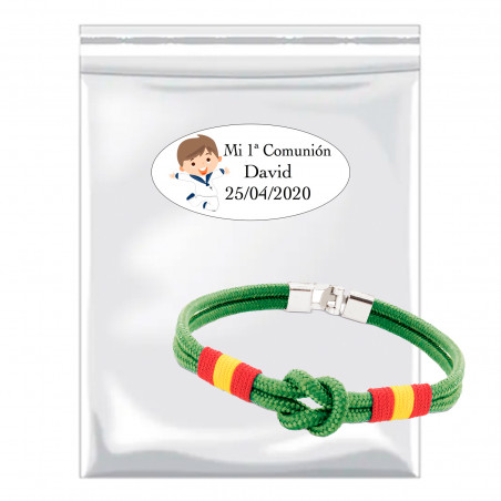 Bracelet en corde dans un sac transparent avec autocollant première communion pour détails