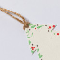 Ornement de Noël avec graines de fleurs dans une enveloppe verte personnalisée pour un détail