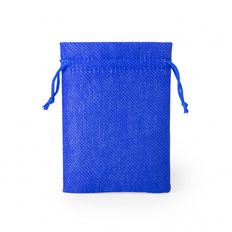 Blocs de construction dans un œuf mystérieux avec des bonbons à mâcher dans un sac avec un autocollant de bande dessinée