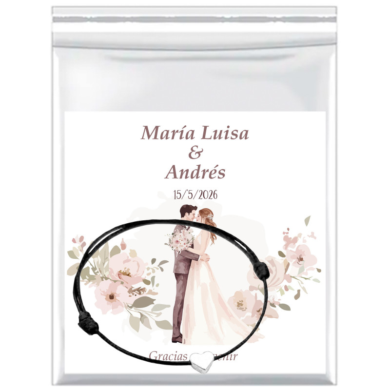 Carte de rappel personnalisée avec bracelet en cordon fin et cœur en argent dans un sac pour les détails de mariage