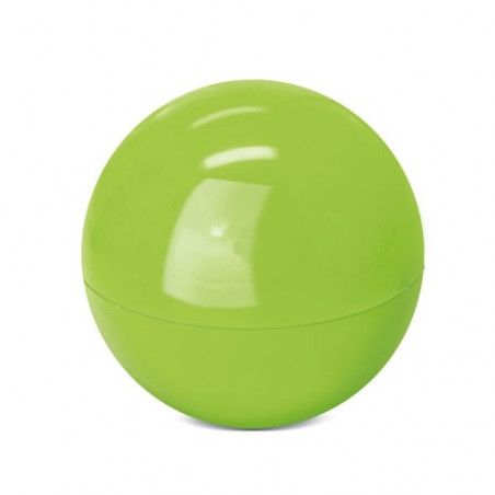 Baume à lèvres sphérique vert dans un sac en organza avec une carte pour la communion d'un garçon