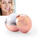 Baume à lèvres sphérique en or rose dans une élégante boîte pour des cadeaux