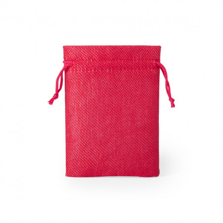 Bougie parfumée dans un pot en verre avec étiquette personnalisée dans un sac en tissu à offrir