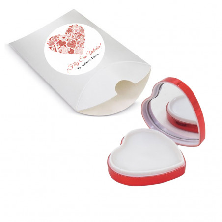 Baume à lèvres en forme de coeur dans une boîte de présentation avec un autocollant romantique à offrir