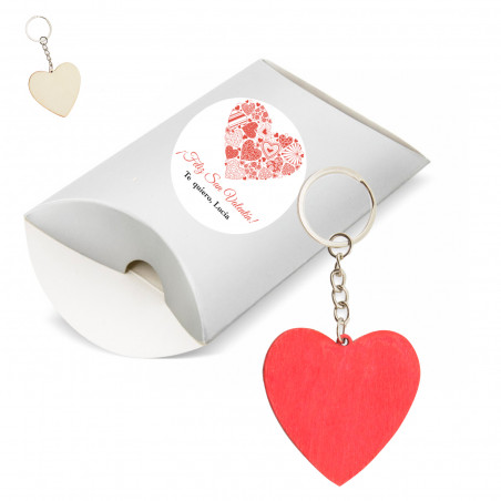 Porte clés coeur dans un étui avec autocollant romantique pour plus de détails