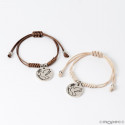 Bracelet de communion colombe de la paix dans un sachet vert d'eau avec autocollant personnalisable