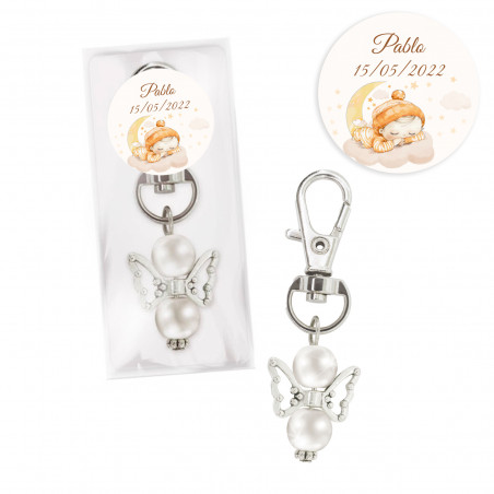Porte-clés ange gardien dans un sachet personnalisé pour baptême
