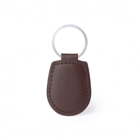 Porte-clés en simili cuir marron et carte de rappel personnalisable dans un élégant sac en tissu pour les souvenirs de première