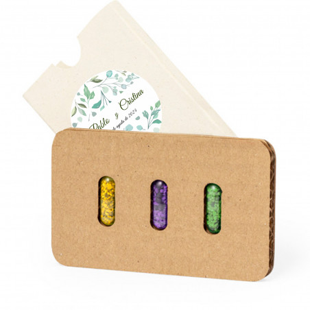 Graine en capsules présentées dans un étui avec un autocollant personnalisable pour des détails écologiques
