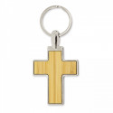 Porte-clés en forme de croix métallique dans une boîte personnalisée avec un autocollant première communion enfant à offrir