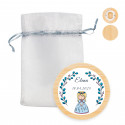 Ouvre-bouteille magnétique avec adhésif première communion fille dans un délicat sac en organza argenté à offrir