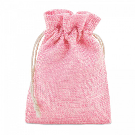 Baume à lèvres en forme de cœur dans un sac rose personnalisé avec baptême de fille