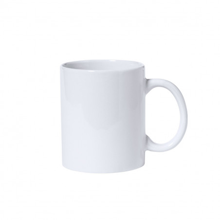 Serviette en forme de petit chien dans une tasse en céramique personnalisée avec un autocollant de première communion pour les