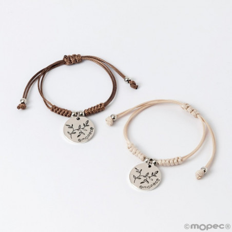 Bracelet avec médaille décorative dans un sachet avec autocollant personnalisable pour les détails
