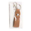 Porte-clés élégant dans un sachet transparent avec autocollant de calice pour les détails de communion