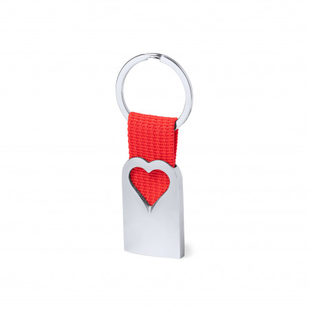 Porte-clés en aluminium découpé en forme de cœur avec un ruban rouge dans un étui de présentation avec un autocollant