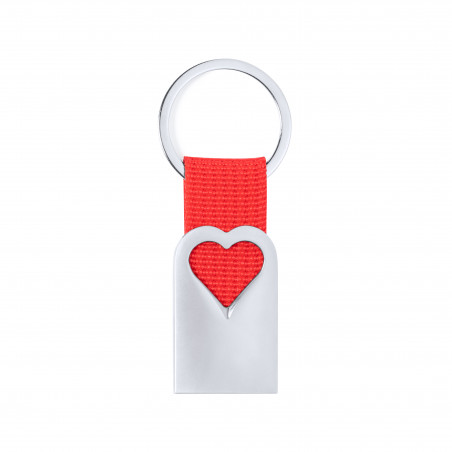 Porte-clés en aluminium découpé en forme de cœur avec un ruban rouge dans un étui de présentation avec un autocollant