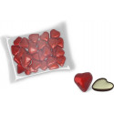 Bonbons en forme de cœur fourrés dans un pot de bonbons avec couvercle et autocollant personnalisé