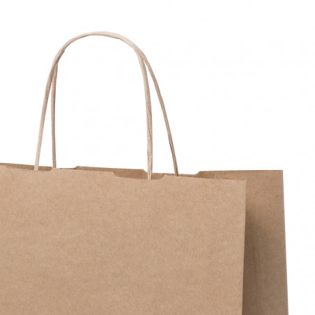 Nécessaire en jute dans un sac en kraft avec adhésif personnalisé