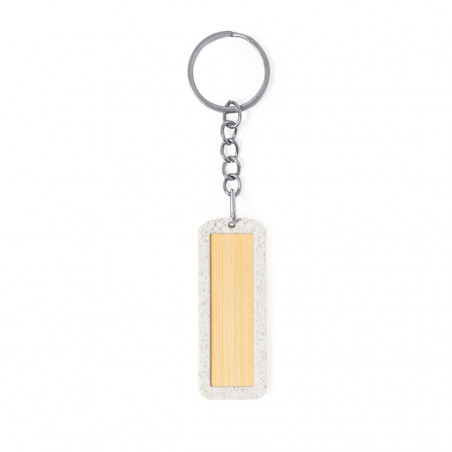Porte clés en bambou et en tige de blé personnalisé avec autocollant de communion dans une enveloppe bleue