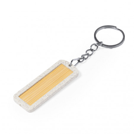 Porte clés en bambou et en tige de blé personnalisé avec autocollant de communion dans une enveloppe bleue
