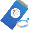 Bracelet élégant avec pompon bleu Un détail exclusif pour les invités