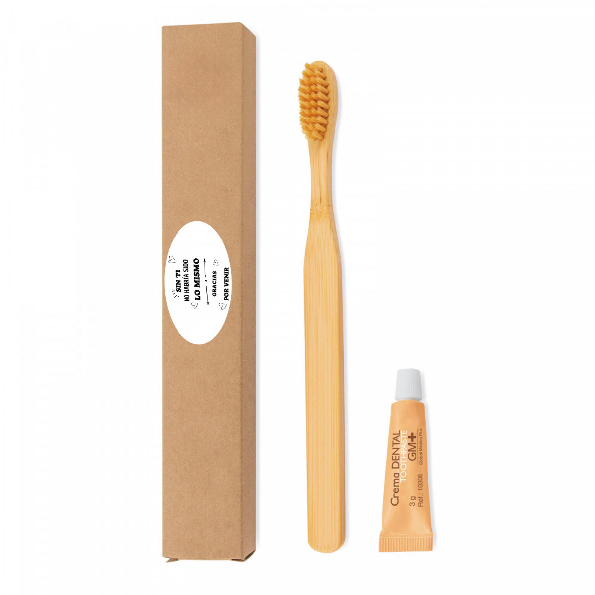 Brosse à dents en bambou et pâte dentifrice dans une boîte avec un autocollant pour les détails des événements et des fêtes.