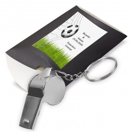 Sifflet en métal avec autocollant de football personnalisé dans une boîte noire.