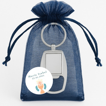 Ouverture de porte-clés personnalisée pour une communion dans un sac en organza