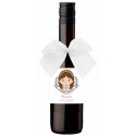 Bouteille de vin personnalisée pour un détail de communion avec un nœud décoratif