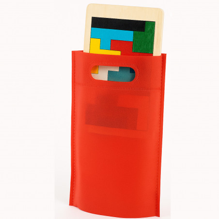 Tetris en bois avec des pièces colorées dans un sac rouge 13x17 et autocollant de Père Noël et amis à offrir à Noël
