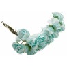 Broches et fleurs baptême